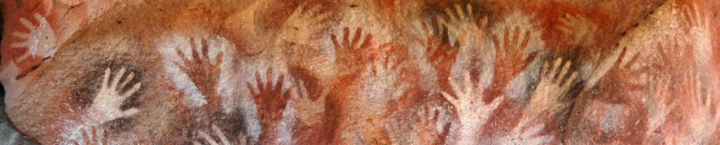 Hand images on cave wall