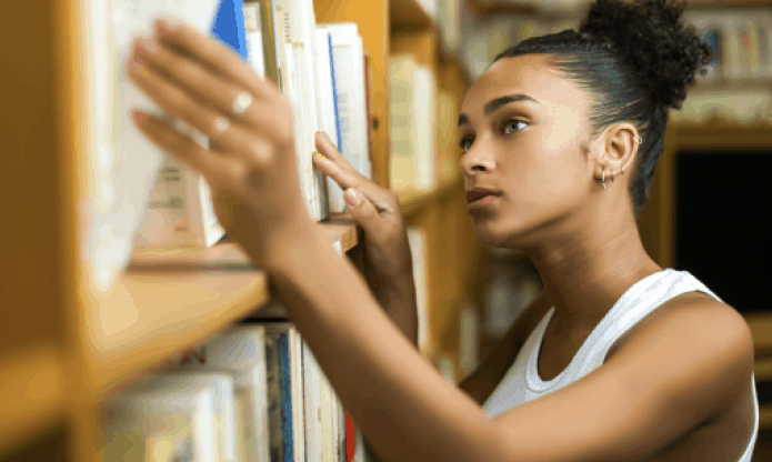 woman taking action in library